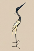 Large Heron metal sculpture with a long dark neck, cream wing panels and slender legs, side view.