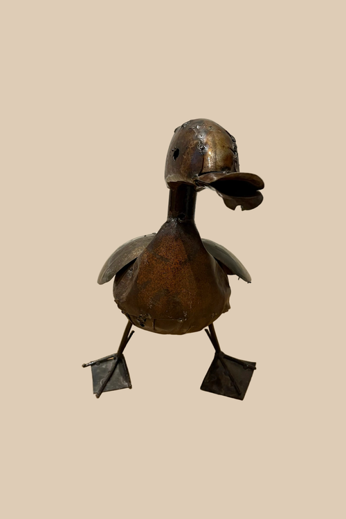 Calling Duck sculpture in dark metal with an open bill and webbed feet, viewed from the front.